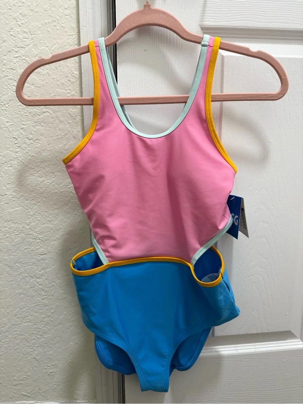 DSG multi colored black one piece swimsuit NWT